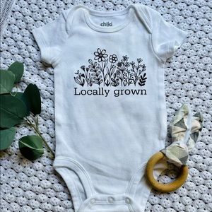 Hand crafted baby onesie